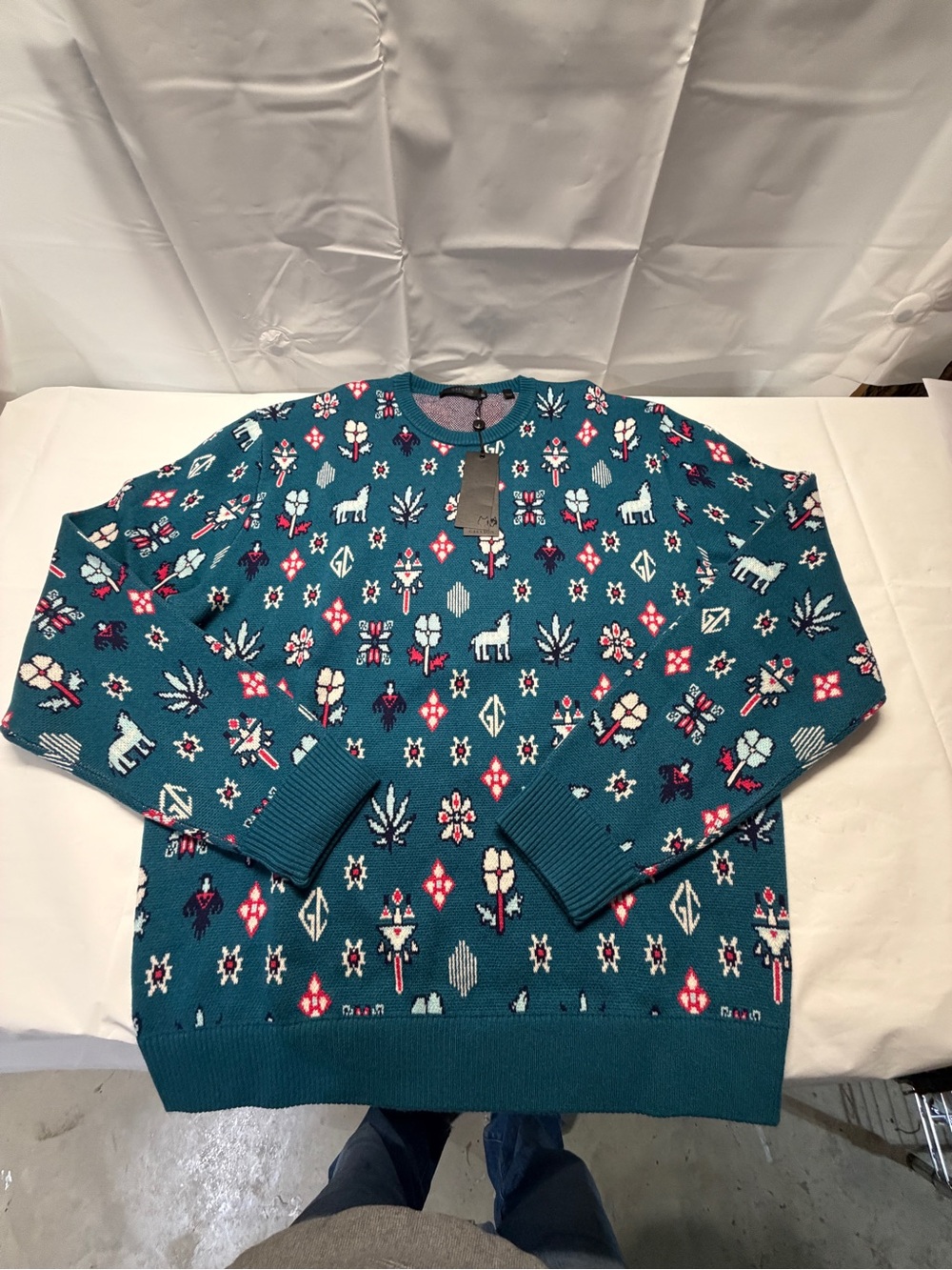 Greyson Teal Crewneck Sweater with Pink, White & Navy Motifs